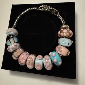 Trollbead pastel blue and pink glass beads on a sterling bracelet and lock